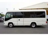 2023 Toyota Coaster LX Big Bang 9-seater White Van for sale, Japanese used car export - photo 3 of 39 | GULJI TRADERS