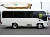 2023 Toyota Coaster LX Big Bang 9-seater White Van for sale, Japanese used car export - photo 5 of 39 | GULJI TRADERS