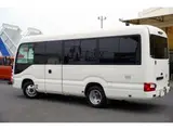 2023 Toyota Coaster LX Big Bang 9-seater White Van for sale, Japanese used car export - photo 7 of 39 | GULJI TRADERS
