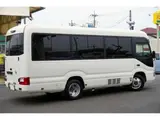 2023 Toyota Coaster LX Big Bang 9-seater White Van for sale, Japanese used car export - photo 8 of 39 | GULJI TRADERS
