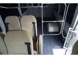 2023 Toyota Coaster LX Big Bang 9-seater White Van for sale, Japanese used car export - photo 14 of 39 | GULJI TRADERS