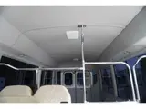 2023 Toyota Coaster LX Big Bang 9-seater White Van for sale, Japanese used car export - photo 15 of 39 | GULJI TRADERS
