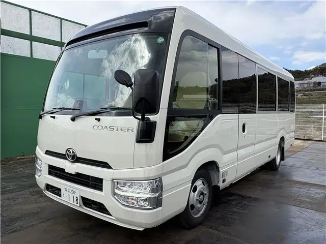 2024 Toyota Coaster Long LX White Van for sale, Japanese used car export | GULJI TRADERS