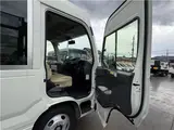 2024 Toyota Coaster Long LX White Van for sale, Japanese used car export - photo 12 of 41 | GULJI TRADERS