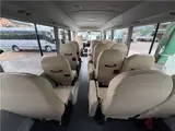 2024 Toyota Coaster Long LX White Van for sale, Japanese used car export - photo 22 of 41 | GULJI TRADERS