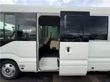 2024 Toyota Coaster Long LX White Van for sale, Japanese used car export - photo 31 of 41 | GULJI TRADERS