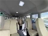 2024 Toyota Coaster Long LX White Van for sale, Japanese used car export - photo 32 of 41 | GULJI TRADERS