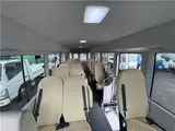 2024 Toyota Coaster Long LX White Van for sale, Japanese used car export - photo 33 of 41 | GULJI TRADERS