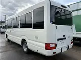 2024 Toyota Coaster Long LX White Van for sale, Japanese used car export - photo 37 of 41 | GULJI TRADERS