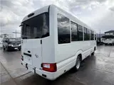 2024 Toyota Coaster Long LX White Van for sale, Japanese used car export - photo 39 of 41 | GULJI TRADERS