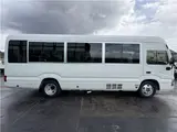 2024 Toyota Coaster Long LX White Van for sale, Japanese used car export - photo 40 of 41 | GULJI TRADERS