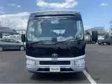 2024 Toyota Coaster GX Long 26-seater Silver Van for sale, Japanese used car export - photo 3 of 24 | GULJI TRADERS