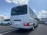 2024 Toyota Coaster GX Long 26-seater Silver Van for sale, Japanese used car export - photo 6 of 24 | GULJI TRADERS