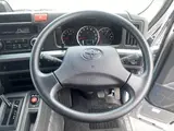 2024 Toyota Coaster GX Long 26-seater Silver Van for sale, Japanese used car export - photo 17 of 24 | GULJI TRADERS