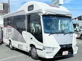 2024 Toyota Coaster Borderbanks Hyper Evo Type T Gold Van for sale, Japanese used car export - photo 2 of 24 | GULJI TRADERS