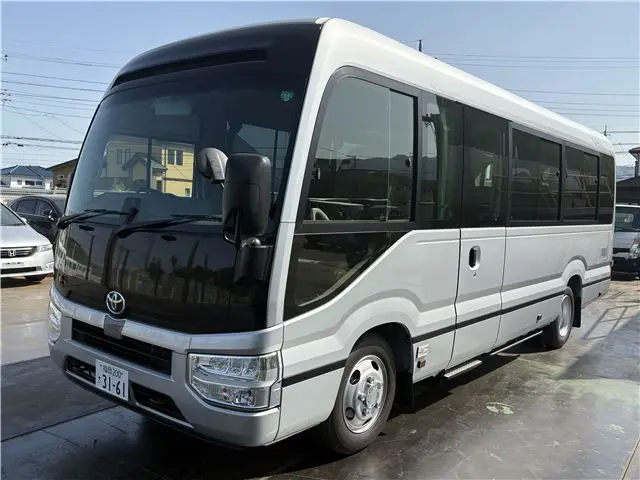 2025 Toyota Coaster Long GX Silver Van for sale, Japanese used car export - photo 1 of 44 | GULJI TRADERS