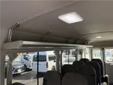 2025 Toyota Coaster Long GX Silver Van for sale, Japanese used car export - photo 23 of 44 | GULJI TRADERS