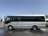 2025 Toyota Coaster Long GX Silver Van for sale, Japanese used car export - photo 38 of 44 | GULJI TRADERS