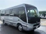 2025 Toyota Coaster Long GX Silver Van for sale, Japanese used car export - photo 40 of 44 | GULJI TRADERS