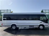 2025 Toyota Coaster Long GX Silver Van for sale, Japanese used car export - photo 41 of 44 | GULJI TRADERS