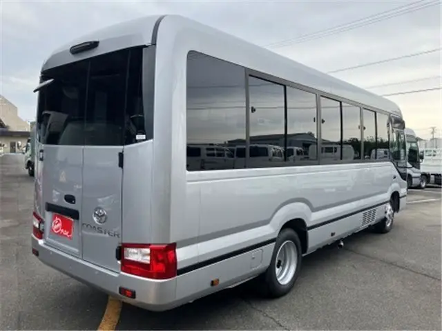 2025 Toyota Coaster GX24 passenger R double doors power heater automatic doors - photo 1 2025 Toyota Coaster GX24 passenger R double doors power heater automatic doors Silver Van for sale, Japanese used car export - photo 1 of 52 | GULJI TRADERS