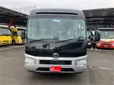 2025 Toyota Coaster GX24 passenger R double doors power heater automatic doors Silver Van for sale, Japanese used car export - photo 4 of 52 | GULJI TRADERS
