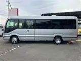 2025 Toyota Coaster GX24 passenger R double doors power heater automatic doors Silver Van for sale, Japanese used car export - photo 6 of 52 | GULJI TRADERS