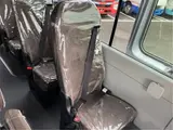 2025 Toyota Coaster GX24 passenger R double doors power heater automatic doors Silver Van for sale, Japanese used car export - photo 51 of 52 | GULJI TRADERS