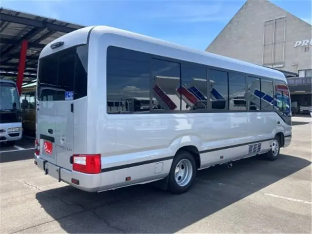 2025 Toyota Coaster GX24 passenger R double doors automatic door navigation system (originally for commercial use) Silver Van for sale, Japanese used car export | GULJI TRADERS