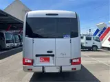 2025 Toyota Coaster GX24 passenger R double doors automatic door navigation system (originally for commercial use) Silver Van for sale, Japanese used car export - photo 5 of 55 | GULJI TRADERS