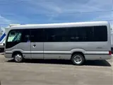 2025 Toyota Coaster GX24 passenger R double doors automatic door navigation system (originally for commercial use) Silver Van for sale, Japanese used car export - photo 6 of 55 | GULJI TRADERS