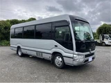 2025 Toyota Coaster Long Sedan for sale, Japanese used car export - photo 1 of 8 | GULJI TRADERS