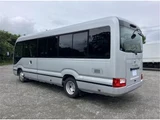 2025 Toyota Coaster Long Sedan for sale, Japanese used car export - photo 2 of 8 | GULJI TRADERS