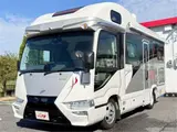 2025 Toyota Coaster Borderbanks Hyper Evoli Gold Van for sale, Japanese used car export - photo 1 of 50 | GULJI TRADERS