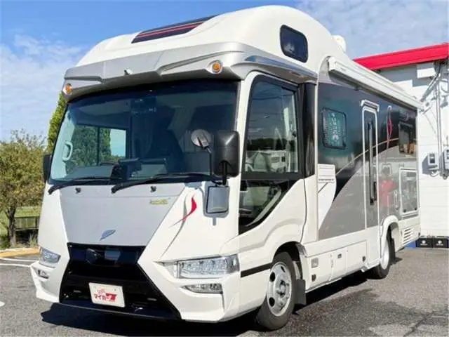2025 Toyota Coaster Borderbanks Hyper Evoli - photo 1 2025 Toyota Coaster Borderbanks Hyper Evoli Gold Van for sale, Japanese used car export - photo 1 of 50 | GULJI TRADERS