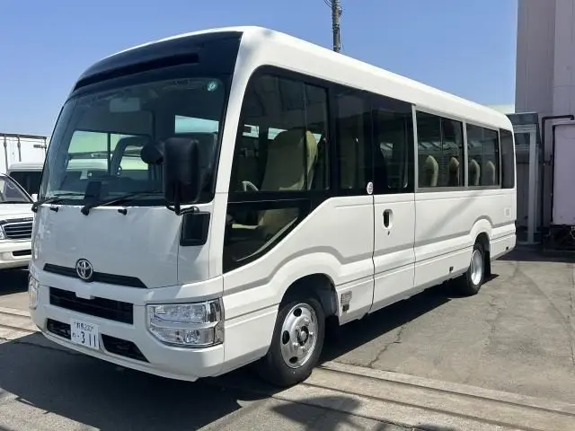 2025 Toyota Coaster LX 27 seater White Van for sale, Japanese used car export | GULJI TRADERS