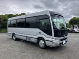 2025 Toyota Coaster Long GX ★TCS★ Automatic Swing Silver Van for sale, Japanese used car export - photo 1 of 8 | GULJI TRADERS