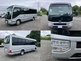 2025 Toyota Coaster Long GX ★TCS★ Automatic Swing Silver Van for sale, Japanese used car export - photo 4 of 8 | GULJI TRADERS