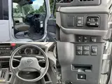 2025 Toyota Coaster Long GX ★TCS★ Automatic Swing Silver Van for sale, Japanese used car export - photo 6 of 8 | GULJI TRADERS