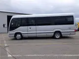 2026 Toyota Coaster Microbus GX, 28-seater, unused, current model, refrigerator, monitor. Silver Van for sale, Japanese used car export - photo 3 of 50 | GULJI TRADERS