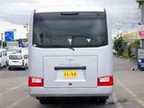 2026 Toyota Coaster Microbus GX, 28-seater, unused, current model, refrigerator, monitor. Silver Van for sale, Japanese used car export - photo 5 of 50 | GULJI TRADERS