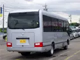 2026 Toyota Coaster Microbus GX, 28-seater, unused, current model, refrigerator, monitor. Silver Van for sale, Japanese used car export - photo 6 of 50 | GULJI TRADERS