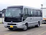 2026 Toyota Coaster Microbus GX, 28-seater, unused, current model, refrigerator, monitor. Silver Van for sale, Japanese used car export - photo 9 of 50 | GULJI TRADERS