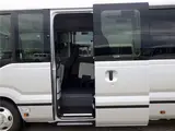 2026 Toyota Coaster Microbus GX, 28-seater, unused, current model, refrigerator, monitor. Silver Van for sale, Japanese used car export - photo 11 of 50 | GULJI TRADERS
