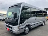 2026 Toyota Coaster GX25 passenger rear double doors automatic doors Silver Van for sale, Japanese used car export - photo 2 of 52 | GULJI TRADERS