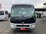 2026 Toyota Coaster GX25 passenger rear double doors automatic doors Silver Van for sale, Japanese used car export - photo 4 of 52 | GULJI TRADERS