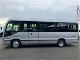 2026 Toyota Coaster GX25 passenger rear double doors automatic doors Silver Van for sale, Japanese used car export - photo 6 of 52 | GULJI TRADERS