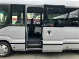 2026 Toyota Coaster GX25 passenger rear double doors automatic doors Silver Van for sale, Japanese used car export - photo 8 of 52 | GULJI TRADERS