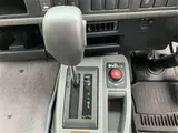 2026 Toyota Coaster GX25 passenger rear double doors automatic doors Silver Van for sale, Japanese used car export - photo 30 of 52 | GULJI TRADERS