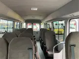 2026 Toyota Coaster GX25 passenger rear double doors automatic doors Silver Van for sale, Japanese used car export - photo 37 of 52 | GULJI TRADERS